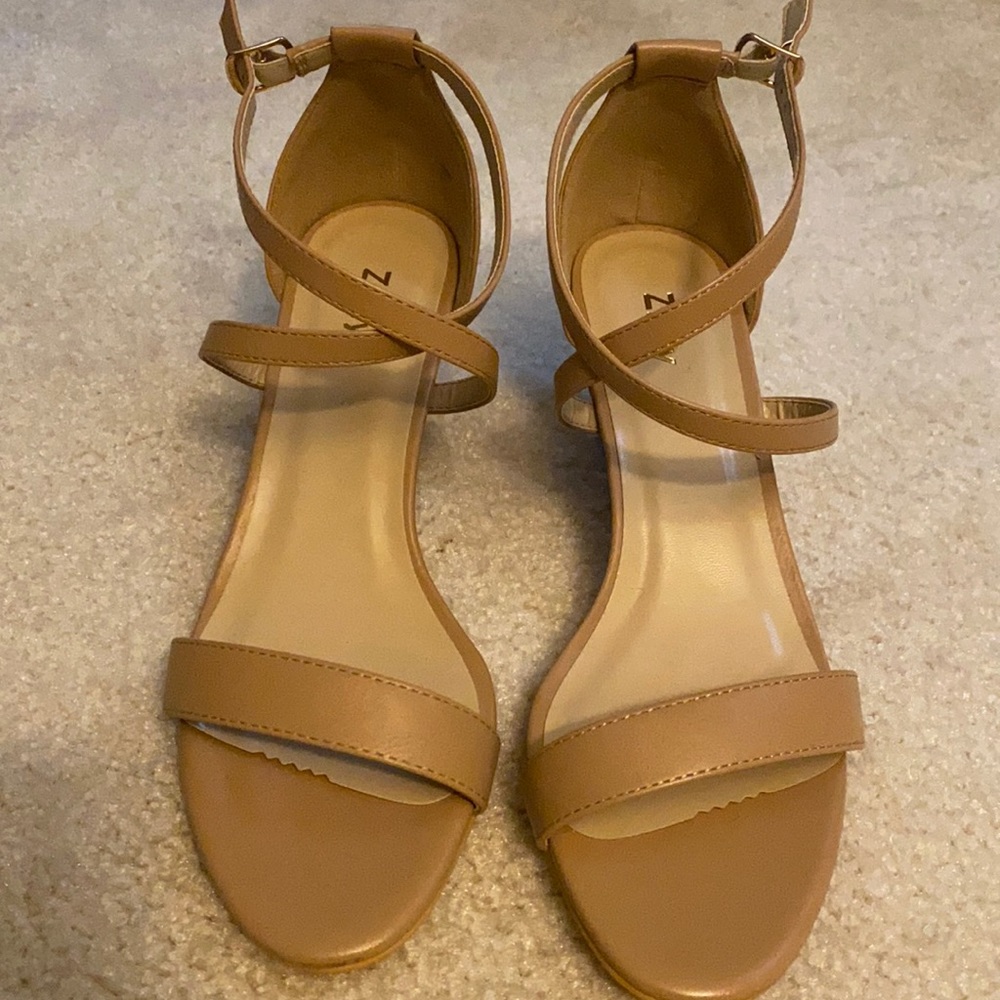 Nude wedge heel with crisscross adjustable straps